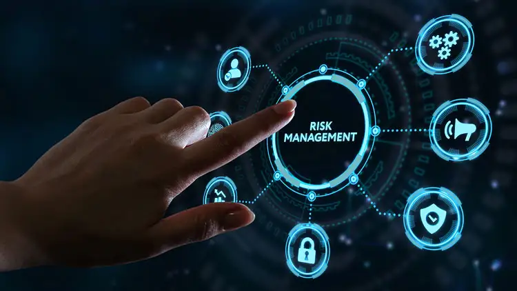 Business team reviewing vendor risk documents and charts